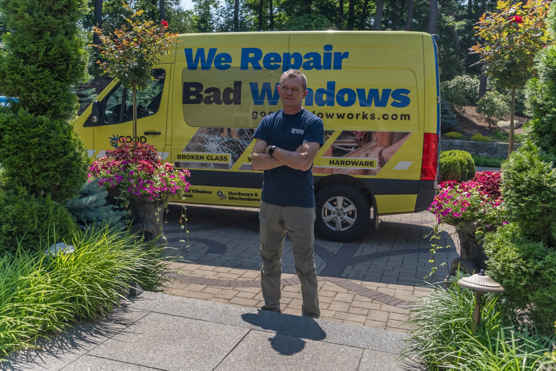 Good Window Works service van in a New England driveway
